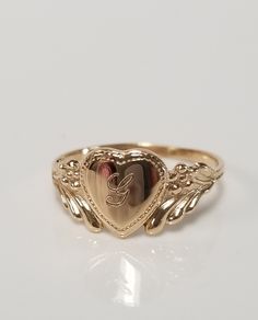 "Thanks for shopping our vintage estate store. We tend to sell well below wholesale and truly hope you enjoy all of our items. Many of the items are one of a kind, so please enjoy scrolling through the pictures and hopefully something will catch your eye. Brown spots are from camera or reflections. Estate 14k yellow gold monogram capital G cursive heart ring. Custom made ring for our shop. Ring size: 3 Setting: 7.5mm 1/4\" to 3/8\" Band width: 1.4mm Weight: .78 gram Marked 14k and it's sweet. On G Initial Ring, G Cursive, Cursive G, J Ring, Freetime Activities, G Initial, G Ring, Antique Style Rings, Custom Wedding Band