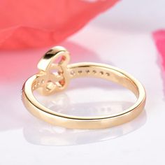 This lovely double-heart ring is adorable. Featuring a double intertwined heart, one in a gold setting and one in a silver setting with a band encased in cubic zirconia set across the top. This ring is the perfect accessory for virtually any outfit. Double Heart Ring, Double Heart, Love Ring, Gold Set, Heart Ring, Cubic Zirconia, The Top, Wedding Rings, Engagement Rings