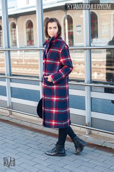 "Elegant long coat for women for autumn, winter and spring seasons. Stylish plaid coat made from soft and warm wool fabric. Feminine, button up wool coat with wide silhouette, classical open collar and two side pockets. It is perfect outside wear solution when warmth and elegance has to be combined! Your will love the quality and design. Sewn with meticulous attention to every detail! DETAILS: * Wool coat for maximum comfort and elegance * Plaid design and classical navy blue/red color combinati Plaid Wool Coat With Long Sleeves, Plaid Wool Coat For Winter, Plaid Wool Outerwear For Winter, Winter Wool Plaid Outerwear, Winter Plaid Wool Outerwear, Single Breasted Plaid Outerwear For Winter, Plaid Single-breasted Outerwear For Winter, Plaid Single-breasted Winter Outerwear, Single-breasted Plaid Outerwear For Winter