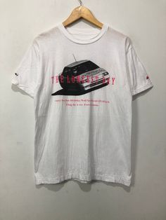 Vintage 90s Subaru T-Shirt Pre-owned: Excellent Size on Tag - Measurement Pit to pit 19" Length 27" I do combined shipping 90s Graphic Print Streetwear T-shirt, 90s Washed T-shirt For Streetwear, Vintage Car Shirt, 90s Cotton Graphic T-shirt, 90s Vintage Print Cotton T-shirt, Subaru, Gender Neutral, Bathing Beauties, Tops & Tees