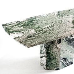 a marbled bench is shown against a white background