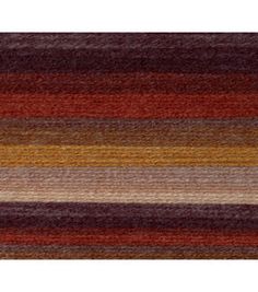 an area rug with multicolored stripes on it