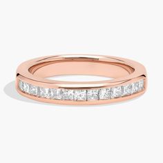 a rose gold wedding band with princess cut diamonds