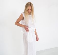 "RILEY is a wide leg cropped linen culottes. DETAILS - Cropped length - Seam pockets - Wide leg - Elasticated waist - 100% lightweight European linen fabric - Cut and sewn to order just for you in our studio COLOR - White (slightly see through), you can also choose other colors above - Fabric samples are available here https://www.etsy.com/listing/586569696/linen-fabric-samples SIZING & FIT - Fits true to size - Length is approximately 35.5 inches / 90 cm - Waist is approximately 13 inches / Cropped Summer Bottoms For Daywear, Summer Cropped Bottoms With Loosely Fitted Hips, Relaxed Fit Linen Cropped Bottoms, Relaxed Fit Cropped Linen Bottoms, White Cropped Bottoms For Daywear, White Linen Wide Leg Pants For Daywear, Linen Culottes, White Linen Trousers, Trousers White