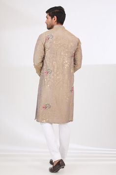 Grey tissue kurta with zari floral and rose motif embroidery. Paired with a cotton silk pant. - Aza Fashions Raw Silk Kurta With Floral Embroidery In Traditional Drape, Unstitched Cotton Silk Kurta For Reception, Eid Cotton Silk Churidar With Floral Embroidery, Jamawar Kurta For Diwali Reception, Diwali Raw Silk Churidar With Floral Embroidery, Bollywood Style Floral Embroidered Sherwani For Festivals, Floral Embroidered Raw Silk Sherwani, Diwali Churidar With Floral Embroidery In Raw Silk, Festive Floral Embroidered Kurta For Reception