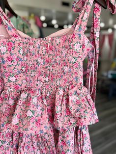 Flaunt your style in the Pierce Floral Corset Ruffle Mini Dress. This charming dress features adjustable shoulder straps that tie into a playful bow, a flattering corset detail, and cascading ruffles. The elastic ruching back ensures a perfect fit. Perfect for a fun and flirty look! (Bow-tiful style - No wonder it's tied up in a bow!) Mini Dress Pink, Floral Corset, Cascading Ruffles, Broken Arrow, Ruffle Mini Dress, Pink Mini Dresses, Dress Pink, Shoulder Straps, Ruffles