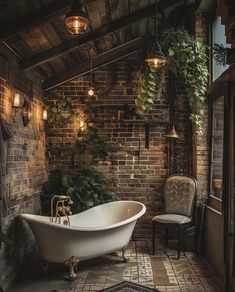 an old fashioned bathtub in the corner of a room with brick walls and flooring