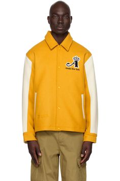 Awake NY: Yellow Crown Jacket | SSENSE Wool Varsity Jacket With Embroidered Logo For Streetwear, Wool Varsity Jacket With Embroidered Logo, Wool Outerwear With Embroidered Logo And Long Sleeves, Wool Outerwear With Embroidered Logo, Fall Outerwear With Logo Patch And Baseball Collar, Varsity Outerwear With Button Closure For Work, Wool Varsity Jacket With Embroidered Logo And Baseball Collar, Wool Outerwear With Embroidered Logo And Baseball Collar, Urban Fall Varsity Jacket With Logo Patch