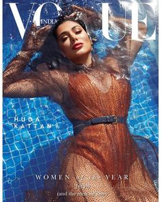 an image of a woman in a mesh dress on the cover of a magazine,