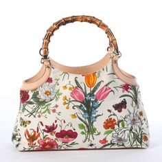 Vintage Gucci Bamboo Top Handle White With Floral Pattern *We Have This Exact Style Bag In Two Other Colors! Condition: Excellent. No Call Outs, It’s In Really Really Great Shape! **This Is A Pre-Owned Piece. We Try Our Best To Accurately Portray Each Piece In Our Photos, Including Any Flaws, But It's Possible We May Miss Things. Colors Of Pieces May Vary Slightly From Photos Due To Lighting Conditions. If There Is Anything You Would Like More Photos Of, Please Just Ask! Bamboo Top, Bags Gucci, Gucci Bamboo, Vintage Gucci, Other Colors, More Photos, Top Handle, Floral Pattern, Bag Lady