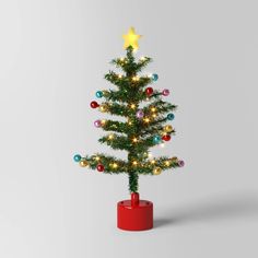 a small christmas tree with lights on it