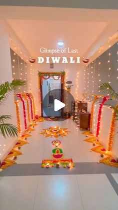 an entrance decorated with lights and garlands for diwali