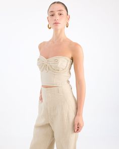 Grace Corset with Rope by Desert Queen Introducing the Grace Corset – where sophistication meets artistry. This strapless corset top boasts a gentle sweetheart neckline, enhancing your silhouette. The standout? An intricate monochromatic rope detail that weaves its charm, adding a touch of avant-garde to a classic piece. 100% Natural Linen Feminine Wedding Corset With Built-in Bra, Elegant Bandeau Corset With Fitted Bodice, Elegant Fitted Corset With Straight Neckline, Spring Tube Top With Corset Back And Sweetheart Neckline, Elegant Bodice With Built-in Bra For Summer, Fitted Corset With Straight Neckline And Corset Back, Feminine Corset With Sweetheart Neckline And Fitted Bodice, Elegant Corset With Straight Neckline, Elegant Strapless Tube Top With Corset Back