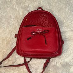 Brand New Red Guess Backpack, Never Used Perfect Condition Red Backpack With Removable Pouch, Trendy Red Rectangular Backpack, Red Satchel Backpack For On-the-go, Red Backpack With Removable Pouch For On-the-go, Trendy Red Backpack, School Backpack With Removable Pouch In Red, Red Satchel Backpack With Zipper Closure, Red Backpack With Zipper Closure, Trendy Red Backpack With Adjustable Strap