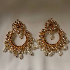 This piece of jewelry pairs perfect with your south asian attire, for weddings, eid, or any special event. All jewelry has been made in Pakistan and is ready to wear. If you have any questions please do not hesitate to reach out to me. White Chandbalis For Eid Celebration, White Bridal Earrings For Eid Celebration, Elegant Chandbalis For Eid And Wedding, Elegant Chandbalis For Wedding And Eid, Heavy Bridal Earrings For Eid, White Chandbalis For Wedding Eid, White Chandbalis For Eid Weddings, White Jhumkas For Eid Party, White Chandbalis For Wedding And Eid