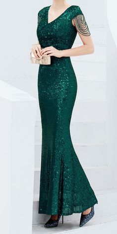 Fitted Green Sequin Evening Dress, Sleeveless Gown With Contrast Sequin For Party Season, Maxi Length Evening Dress With Contrast Sequin For Prom, Contrast Sequin Floor-length Maxi Dress For Prom Season, Floor-length Contrast Sequin Maxi Dress For Prom, Floor-length Maxi Dress With Contrast Sequin For Prom, Floor-length Contrast Sequin Maxi Dress, Evening Maxi Dress With Contrast Sequin, Contrast Sequin Maxi Dress For Prom