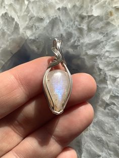 Belomorite also known as Sunstone with Moonstone wire wrapped in 925 sterling silver Please care for your silver with a polishing cleaning cloth. Pittsburgh Pa, Cleaning Cloth, Sterling Silber, Pendant Necklaces, Pittsburgh, Wire Wrapped, Wire Wrapping, Halloween Shopping, Moonstone