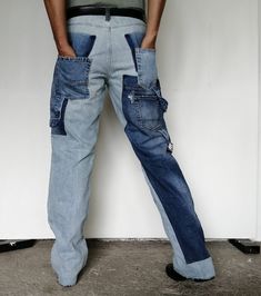 "Faded Denim Jeans and Distressed Blue Carpenter Pant, waist 34, with two recycled Denim Patch Pockets front- and backsides. The different decorations make this Upcycled Mens Work Pants a Unique Patched Tough Boyfriend Jeans. Discover this affordable and fashionable straight light distressed boot cut Workwear Jeans!  Measures: *Circular Measurements Waist:        90 Centimeters - 35 Inches*  Hip:          108 Centimeters - 43 Inches*  Length:    116 Centimeters - 46 Inches  Hem:         50 Centi Washed Blue Denim Cargo Jeans With Hip Pockets, Faded Denim Cargo Jeans For Streetwear, Baggy Blue Recycled Denim Jeans, Blue Baggy Recycled Denim Jeans, Distressed Dark Wash Recycled Denim Cargo Jeans, Distressed Recycled Denim Cargo Jeans In Dark Wash, Blue Distressed Rigid Denim Cargo Jeans, Light Wash Denim Cargo Jeans With Hip Pockets, Fitted Rigid Denim Cargo Jeans