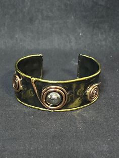 "Vintage Mixed Metal Brutalist Revival Cuff Bracelet. There are no hallmarks on it. It measures: 2 3/4\" from one side to the other X 1\" It comes with a gift box. (Jewelry # 4045) USA Seller!! Estate sale find. We do not Clean or Polish our Estate Jewelry we will leave that to you. We also have Jewelry, Hallmark Ornaments, Dept 56, Vintage Glassware and many other items. We will combine shipping for multiple items if possible. Features: * Cuff Bracelet Size: Womens 2 3/4\" X 1\" Condition: Pre-Owned Like New" Vintage Hand Cast Bangle Cuff Bracelet, Vintage Hand Cast Cuff Bangle Bracelet, Vintage Hand Cast Cuff Bangle, Silver Artisan Brass Cuff Bracelet, Hand Forged Brass Cuff Bracelet In Silver, Adjustable Artisan Metal Bangle, Hand Forged Silver-colored Brass Cuff Bracelet, Hand Cast Bronze Metal Cuff Bracelet, Hand Forged Silver Brass Cuff Bracelet