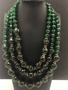 Chunky Green Necklace, Huge Lucite Rhinestone Necklace, 3 Strand Necklace, 1960's Vintage Jewelry Style: 1960's Glam Huge green rhinestone clasp Color: gold tone metal, green stones Size: 20 inches long  Condition: Very good vintage condition Approximate Date: 1960's Hallmarks/signature: None For more vintage necklaces.... http://etsy.me/1RY2UxM For more jewelry & collectibles.... www.etsy.com/shop/MartiniMermaid d96 Pinup Jewelry, Cherry Necklace, Dangle Bracelet, White Beaded Necklaces, Chunky Bead Necklaces, Vintage Beads Necklace, Green Stones, Vintage Necklaces, Chunky Beads