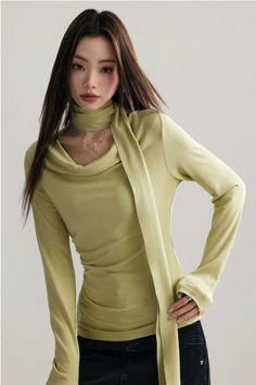 Set the scene with our Asymmetrical Draped Neckline Long Sleeve Top with Scarf, a chic statement piece perfect for any occasion.
Expertly crafted from a blend of 92% cotton and 8% spandex, this top promises both comfort and a flattering fit. Its unique draped neckline and form-fitting silhouette are accentuated by a stylish scarf that can be styled in multiple ways, ensuring your look is both sophisticated and versatile.
Whether it's for a casual day out or a polished office ensemble, this top p Winter Fitted Tops With Asymmetrical Neckline, Fitted Tops With Asymmetrical Neckline For Winter, Winter Fitted Top With Asymmetrical Neckline, Winter Asymmetrical Neckline Fitted Top, Chic Tops With Asymmetrical Neckline For Winter, Elegant Asymmetrical Cotton Top, Elegant Green Tops For Layering, Modern Green Tops For Fall, Modern Green Top For Fall