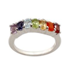 Colorful gems of powerful beauty are designed to align with their respective chakras in a ring from Alok Jain. Crafted of sterling silver the ring is crowned with amethyst iolite citrine peridot garnet quartz and carnelian set within a gentle curve. Their colors correspond to a specific chakra for clear and light purple stones are associated with the 7th chakra (awareness and wisdom); the purple violet and indigo gems with the 6th chakra (insight and perception) and the blue or light blue with t Chakra Ring, Rainbow Ring, Multi Gemstone Ring, Rainbow Rings, Chakra Necklace, Rainbow Jewelry, Chakra Jewelry, Sterling Silver Jewellery, Yoga Jewelry