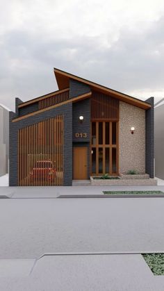 the front view of a modern house with wood slats