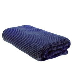 a blue blanket folded on top of each other