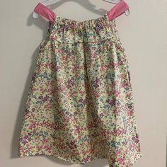 100% Cotton Turn Inside Out To Machine Wash Cotton Floral Print Sundress For Playtime, Playful Yellow Dress For Dress-up, Multicolor Cotton Sundress For Play, Yellow Floral Print Dress For Dress-up, Yellow Floral Print Dress For Dress-up Occasions, Yellow Dresses With Floral Print For Dress-up, Multicolor Cotton Sundress For Babies, Multicolor Spring Sundress For Babies, Cute Multicolor Sundress For Play