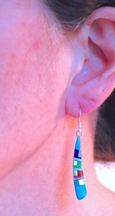 "This is a pair of Zuni multi gem inlay earrings. They are set in sterling silver with sterling earring hooks. -approx. 2\" X 1/4\" at the widest point -stamped sterling Check out the rest of our collection: https://www.etsy.com/shop/NewMexicoGems" Inlay Jewelry, Gem Earrings, Native American Turquoise, American Turquoise, Earring Hooks, Turquoise Earrings, Gorgeous Earrings, Minimalist Earrings, Sterling Earrings