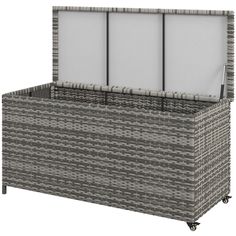 an outdoor wicker storage box on wheels