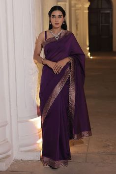 Jamuni purple saree crafted in moonga silk with gold toned mughal fleur woven detail along the scallop border. Paired with a strap sleeves square neck blouse. - Aza Fashions Scallop Border, Purple Saree, Border Saree, Back Neck Designs, Utsav Fashion, Georgette Blouse, Violet Color, Net Saree, Art Silk Sarees