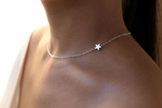 adjustable choker: shortest: 40.8 cm longest: 46.0 cm Available in gold Silver Star-shaped Dainty Jewelry, Adjustable Delicate Jewelry With Star Charm, Elegant Adjustable Charm Necklace With Star Charm, Elegant Adjustable Star Charm Necklace, Simple Silver Charm Necklaces For Wedding, Simple Silver Choker Jewelry, Silver Star-shaped Jewelry With Delicate Chain, Dainty Star-shaped Wedding Jewelry, Silver Jewelry With Star Charm For Wedding