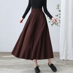 "★★ FEATURES * cotton linen skirt * no lining * Two side seam pockets * Wide elastic waistband * pleated waist detail * Plus size full skirt * A Line Skirt * Perfect for Spring Autumn * Wash by hand or machine with cold water ★★ The model is 170 cm (5′ 7″) tall with a 80 cm (31.5\") bust, 66 cm (26\") waist. She is wearing the brown linen skirt in size XS. ★★ Please select custom order according to the follow situation Your height is not between 155 cm- 172 cm Your weight is over 75 kg Request t Baggy Solid Skirt For Fall, Non-stretch Long Brown Skirt, Non-stretch Brown Long Skirt, Long Brown Cotton Skirt, Brown Cotton Long Skirt, High Waist Gathered Skirt For Fall, Non-stretch Brown Cotton Skirt, Brown Long Cotton Skirt, Brown Cotton Maxi Skirt With Lined Skirt