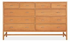 a large wooden dresser with many drawers on each drawer and one side missing the top