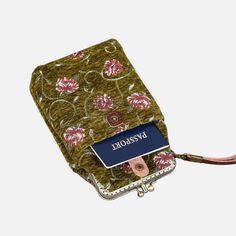 With a nod to the Victorian era, MCW’s freshly combines the classic and elegant design of the traditional carpet bag with a textural and tactile twist.The main body of the functional phone case is made with rich chenille carpet, cotton floral canvas, and brass clasp with double kiss lock. With the width 4.15" and height 8.60" it can easily hold phones of any sizes (max phone width to 4"), with the leather wrist strap that comes with the bag. There are two mini rings at both sides of the clasp an Vintage Phone Bag With Removable Pouch For Travel, Vintage Travel Phone Bag With Removable Pouch, Vintage Rectangular Phone Bag With Removable Pouch, Vintage Phone Bag With Removable Pouch, Rectangular Travel Mobile Phone Case, Rectangular Mobile Phone Travel Case, Vintage Phone Bag With Cell Phone Pocket For Travel, Vintage Phone Bag For Travel, Vintage Travel Phone Bag With Cell Phone Pocket