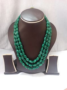 AAA 734 Carat Emerald beryl Oval Shape Fine Quality Smooth Beads With Adjustable Cord Necklace Stone : Emerald beryl Shape :- Oval Size :-6x8 - 12x17mm length - 18 inch, 3 line strings Weight :- 734 carat Polish :- Handmade color - green It is known as the 'love stone' as the message it emits is the strong vibration of unconditional love, joy, warmth and healing. As quartz crystals are profound amplifiers of energy, it may help to kindle happiness, love, romantic feelings and sensuality. It is g Green Oval Polished Beads Jewelry, Elegant Emerald Necklace With Oval Gemstone Beads, Traditional Oval Necklaces With Polished Beads, Elegant Gemstone Oval Beads, Oval Emerald Bead Necklace For Jewelry Making, Emerald Necklace With Oval Gemstone Beads For Jewelry Making, Oval Green Beaded Jewelry, Green Oval Beaded Jewelry, Green Oval Gemstone Beads Necklace