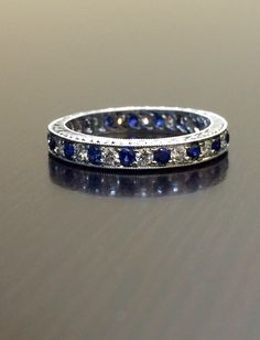 DeKara Designs Collection Metal- 90% Platinum, 10% Iridium. Stones- 12-18 Round Diamonds, G Color VS1 Clarity, 0.40-0.55 Carats, 12-18 Round Ceylon Blue Sapphires, 0.40-0.65 Carats (Carat weight depends on your finger size) Size- 3-13 Please indicate your specific size by sending me a conversation on etsy, or putting it in the notes of the transaction. Band will be made in your size within 5-7 working days. Will start working on your band as soon as transaction has been processed. If you're look Blue Sapphire Eternity Band, Blue Sapphire Wedding Band, Sapphire Eternity Band, Sapphire And Diamond Band, Pink Sapphire Pendant, Diamond Engagement Band, Sapphire Diamond Engagement, Ceylon Blue Sapphire, Sapphire Wedding Band