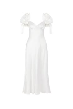 The Poet Slip, a silk charmeuse maxi dress cut on the bias for an impeccable fit, drapes elegantly over the body, creating a graceful and dreamy silhouette. The luminous ivory silk, bone white and smooth as porcelain, features puff sleeves and soft cups, with charming silk bows at the shoulder and cuff. Stunning for a romantic elopement in a sun-dappled Tuscan vineyard or an intimate ceremony in a botanical garden. Bias-cut silk charmeuse slip dress with soft cups and bow details No underwire Pu White Selkie Dress, Bridal Midi Dress, Selkie Bridal, Rehearsal Dinner Dress For Bride, White Prom Dress Mermaid, Elopement Outfit, White Puff Sleeve Dress, Plain White Dress, Tuscan Vineyard