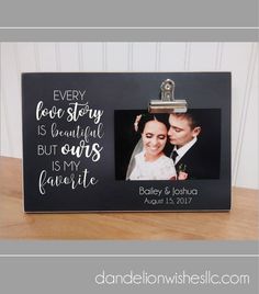 a black frame with a couple's wedding photo and the words every love story is beautiful but ours is my favorite