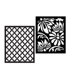 two black and white paper cut outs with flowers on them