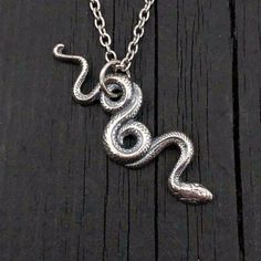 Snake-shaped Engraved Jewelry Gift, Engraved Snake-shaped Jewelry Gift, Nickel-free Snake-shaped Jewelry Gift, Collectible Silver Necklace Nature-inspired, Silver Symbolic Snake-shaped Necklace, Silver Spiritual Snake Chain Jewelry, Silver Snake Necklace With Symbolic Style, Symbolic Sterling Silver Snake Chain Jewelry, Symbolic Sterling Silver Snake Chain Necklace