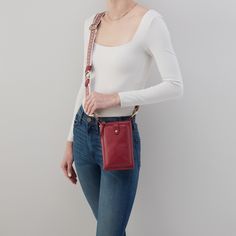 Keep your essentials close by and organized on the go. Cass Phone Crossbody In Pebbled Leather  Wine SLG PHONE CROSSBODY Bag in Wine | Hobo® Functional Phone Bag With Adjustable Strap For On-the-go, Functional Phone Bag With Adjustable Strap, Casual Red Portable Phone Bag, Functional Daily Use Crossbody Phone Bag, Red Casual Phone Bag, Functional Phone Bag With Removable Pouch, Functional Everyday Phone Bag With Cell Phone Pocket, Functional Phone Bag With Cell Phone Pocket, Versatile Red Rectangular Phone Bag