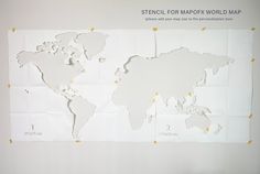 a white map with yellow pins on it and the words stencil for marpox world map