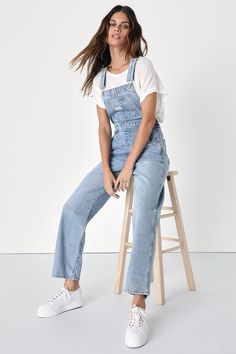 The Levi's Vintage Medium Wash Overalls are a tried and true staple that we know you're going to love! Sturdy denim (in Levi's What A Delight wash) shapes these classic overalls that have a front bib with a patch pocket and adjustable straps that form into a modified racerback. A seamed waist tops relaxed fit straight leg bottoms with two front pockets and two back pockets. Branded button closures at the hips. Red logo tag at back. Fit: This garment fits true to size. Length: Ankle length. Size Overall Outfits Fall, Cute Overall Outfits, Overall Outfits, Store Outfits, Overalls Blue, 7 Months Pregnant, Thrift Store Outfits, Cute Overalls, Overall Outfit