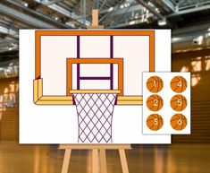 an easel with a drawing of a basketball hoop on it