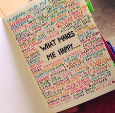 a notebook with writing on it that says what makes me happy