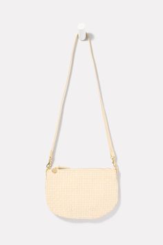 A chic bag in a just-right size, the Petit Moyen is the perfect everyday accessory. This mini messenger bag by Clare V is crafted with handwoven leather and includes two detachable straps to wear on the shoulder or as a crossbody. Cream Leather Shoulder Bag With Woven Details, Natural Color Clutch Shoulder Bag With Detachable Strap, Beige Woven Leather Clutch Shoulder Bag, Beige Woven Leather Clutch Bag, Intrecciato Weave Shoulder Bag Clutch, Everyday Intrecciato Weave Pouch Shoulder Bag, Cream Woven Leather Shoulder Bag, Chic Cream Shoulder Bag With Woven Leather, Cream Woven Leather Shoulder Bag For Daily Use