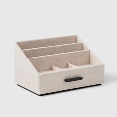 an office desk organizer with three compartments