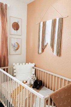 a baby crib in the corner of a room